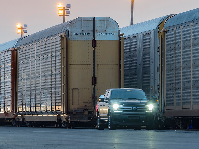 Ford teases all-electric F-150 pickup truck by pulling a million-pound train