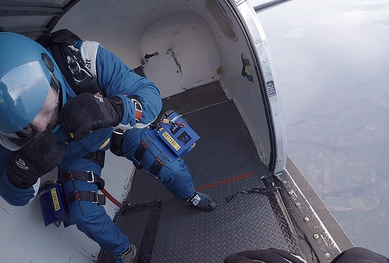 Making final adjustments seconds before jumping from 15,000ft with the thigh-mounted EDFs
