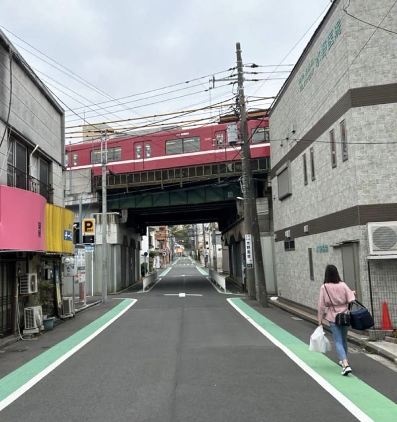 One of the many JR trains passed overhead in Yokohama, reducing car use